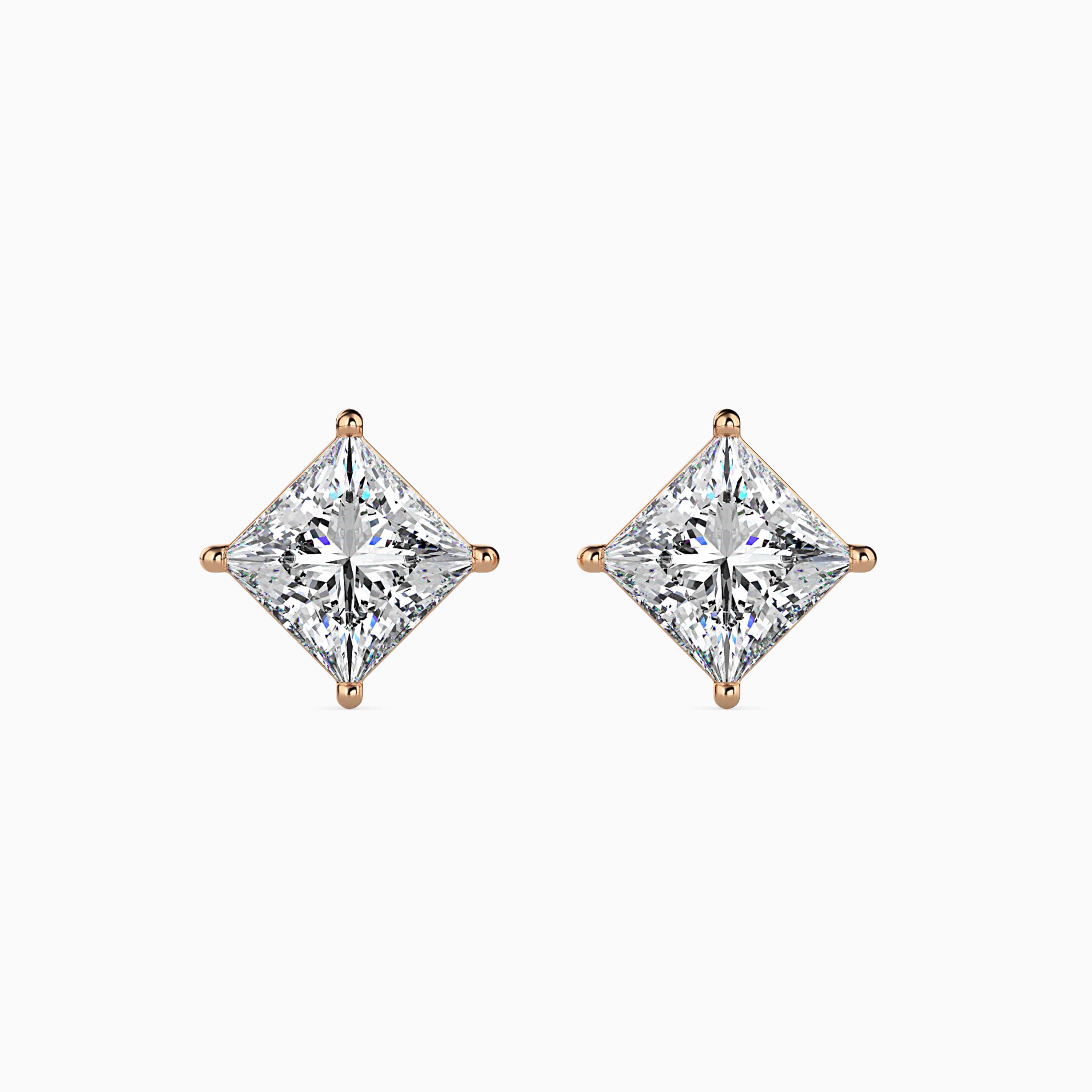 DIAMOND TUSK EAR STUDS